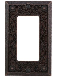 Filigree Single-GFI Switch Plate in Aged Bronze.